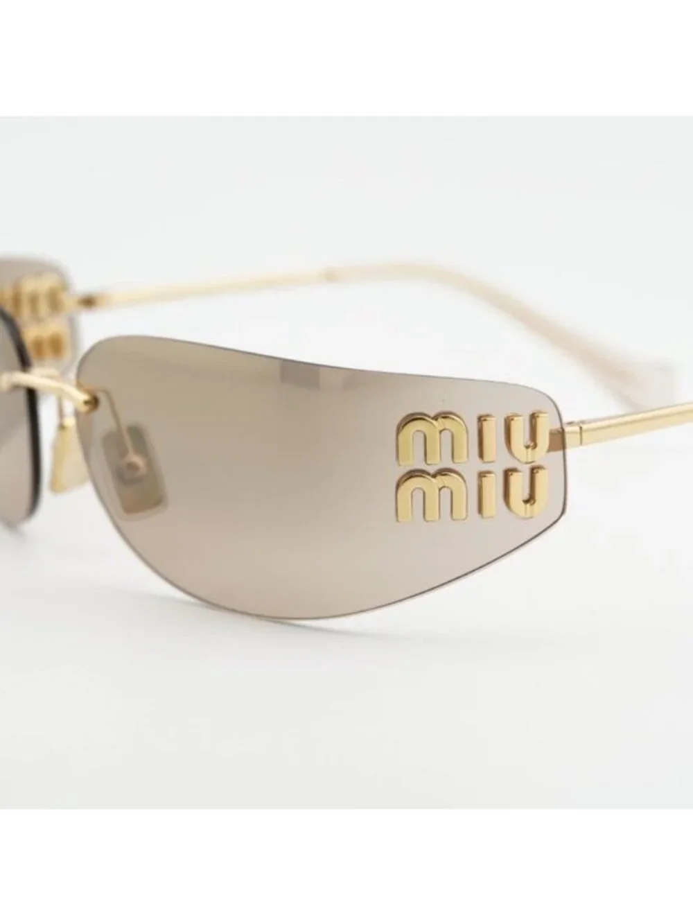 Miu Miu MUA51S 5AK20P Sunglasses Gold Rectangle Frame, Bronze Mirror Lenses